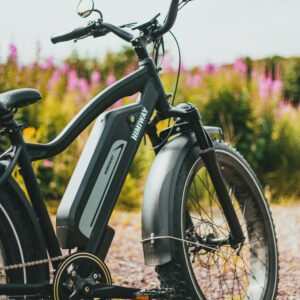 Close-up of a parked bicycle with a blurred natural background, perfect outdoor adventure image.